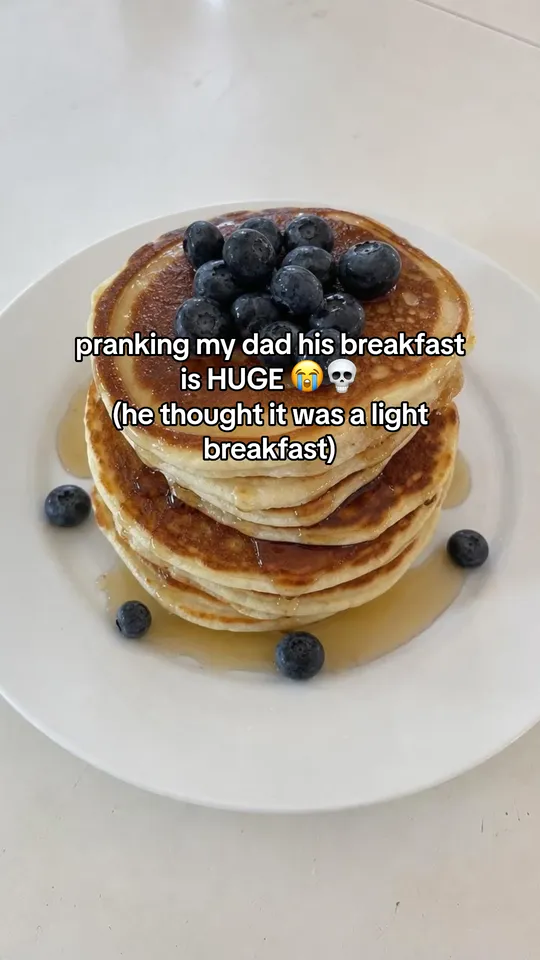 Prank post over a photo of pancakes: pranking my dad, his breakfast is huge (he thought it was a light breakfast)